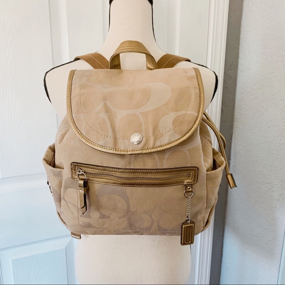 Coach Handbags - Coach Backpack tan gold cream drawstring